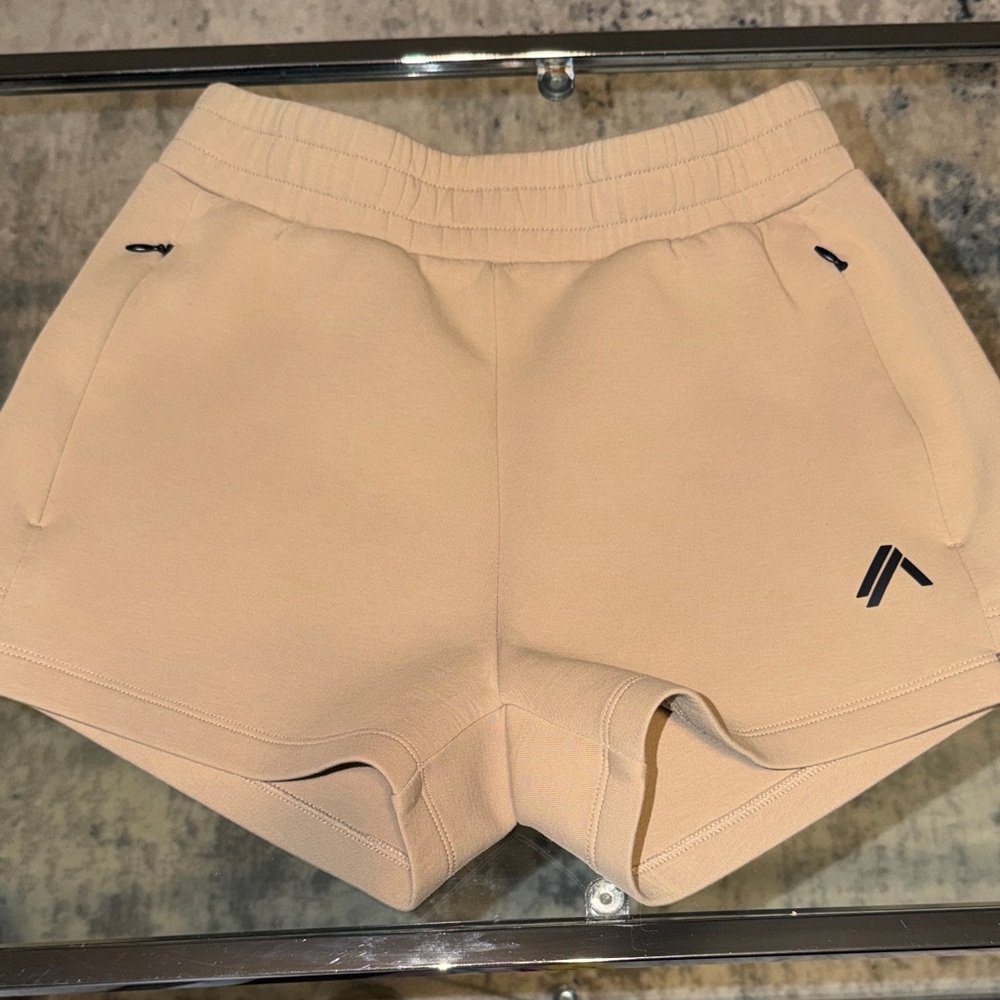 Alphalete Women's Athletic Shorts in Tan